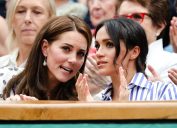 London, UK, 14th July 2018: Catherine Kate Duchess of Cambridge and Meghan, Duchess of Sussex, visiting the men's semifinal at day 12 at the Wimbledon Tennis Championships 2018 at the All England Lawn Tennis and Croquet Club in London.