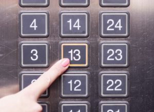 Woman Pressing Thirteenth Floor