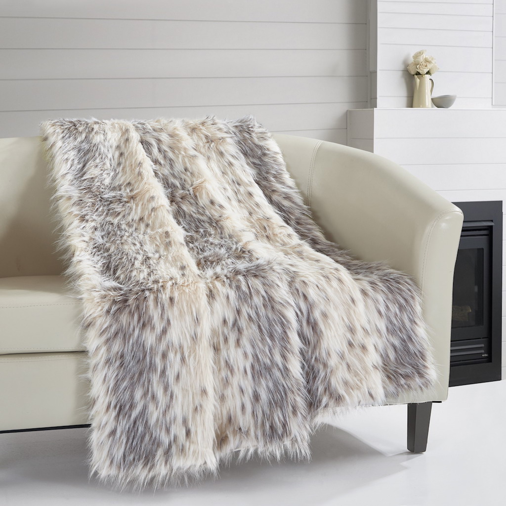 faux fur blanket on white sofa