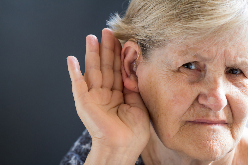 Older Woman is Having Trouble Hearing {Allergy Symptoms}