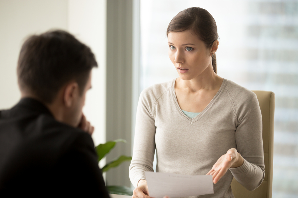 woman arguing with man, things you should never say to your spouse