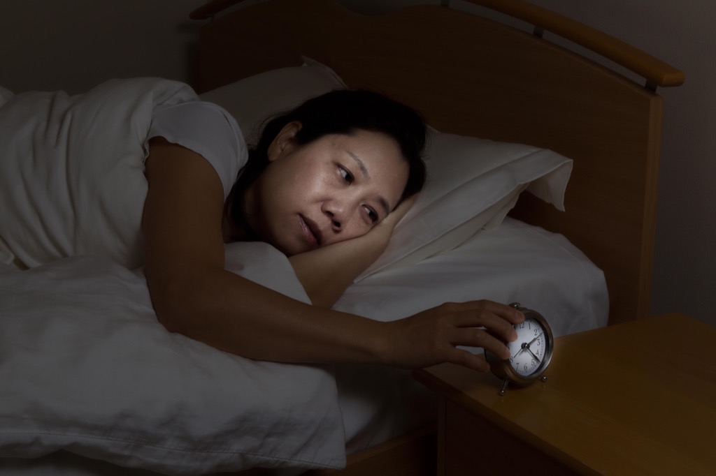 woman with insomnia, signs you need a new mattress