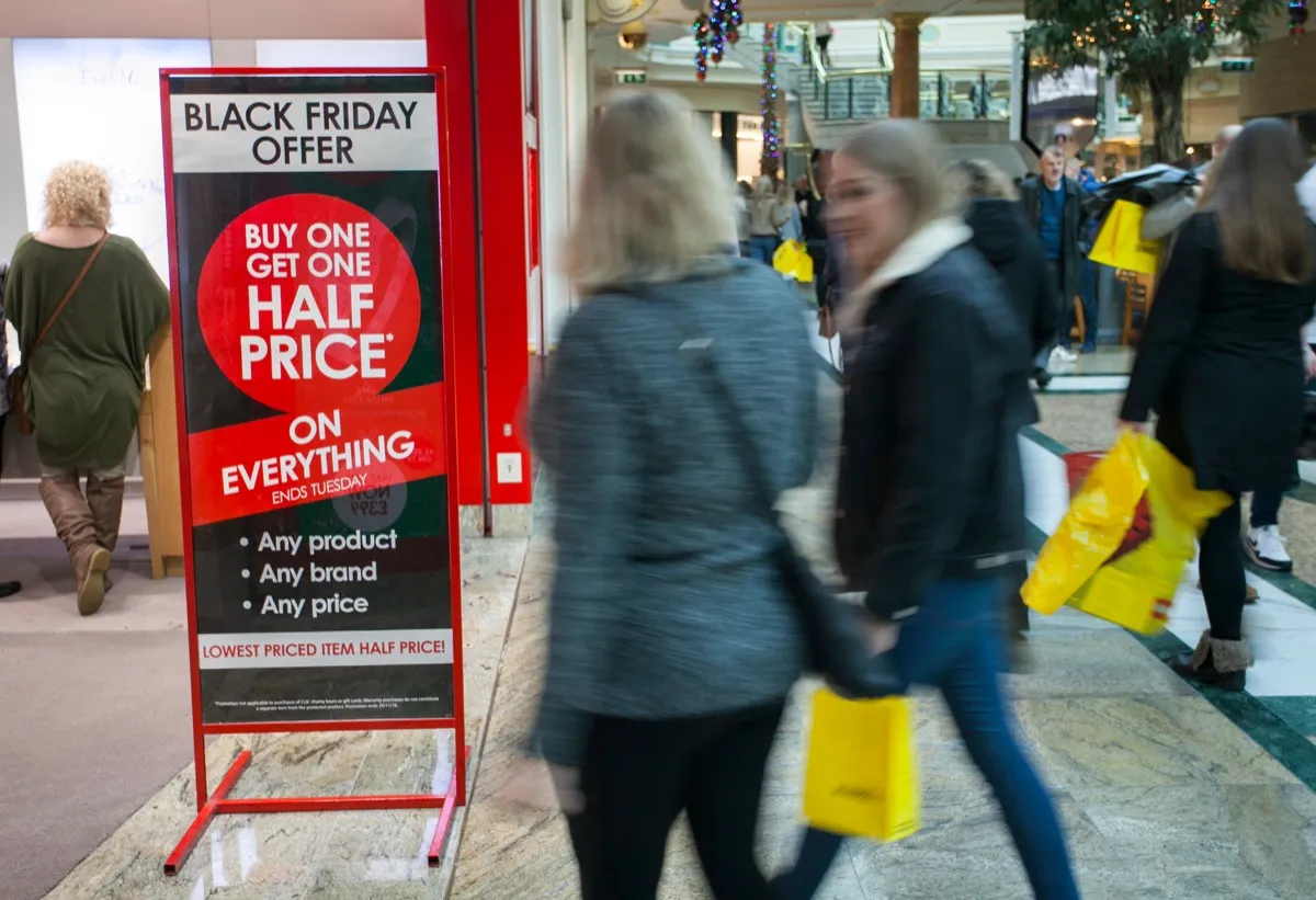 Shoppers on Black Friday entering a store {Shopping Tips}