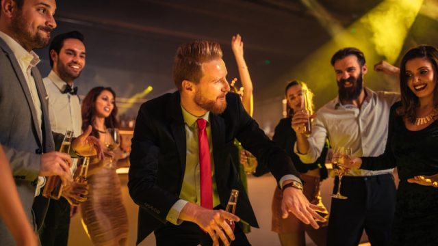 annoying guest dances at holiday party
