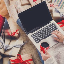Woman Doing Christmas Shopping Online on her Computer {Discount Shopping}