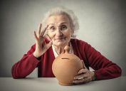 Grandmother with a piggy bank, representing financial advice