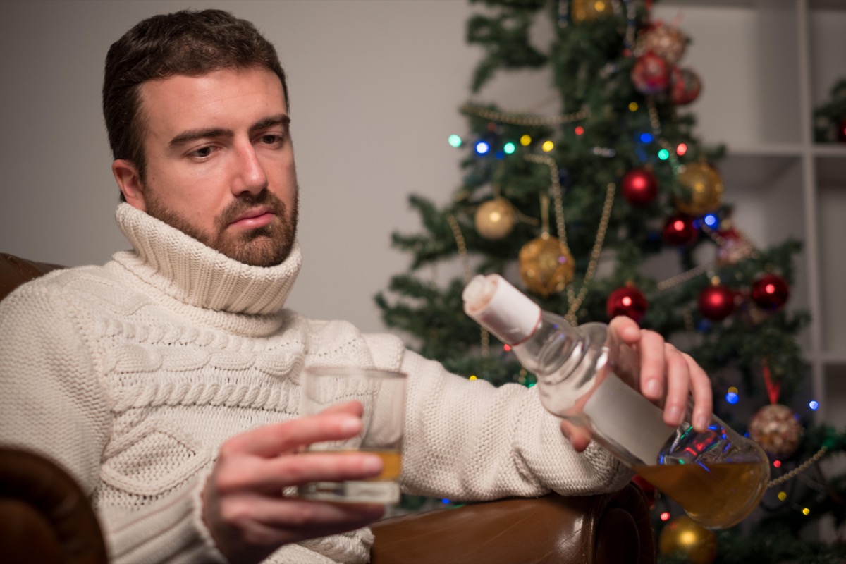 Man drinking alone on Christmas