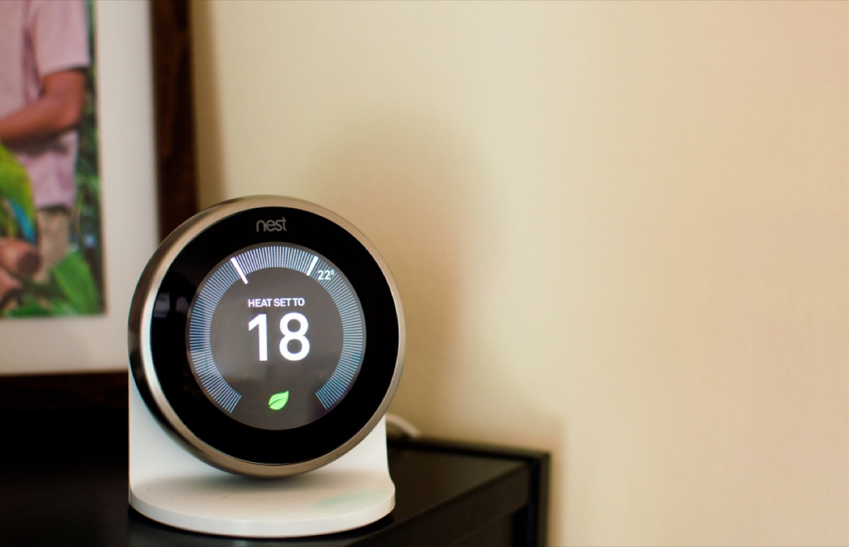 nest learning thermostat on table