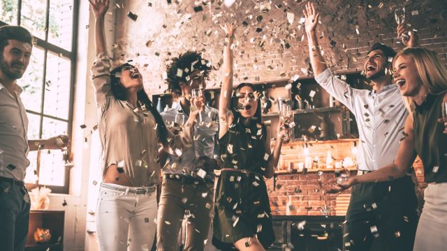 people celebrating all the good news in 2018 with a confetti party