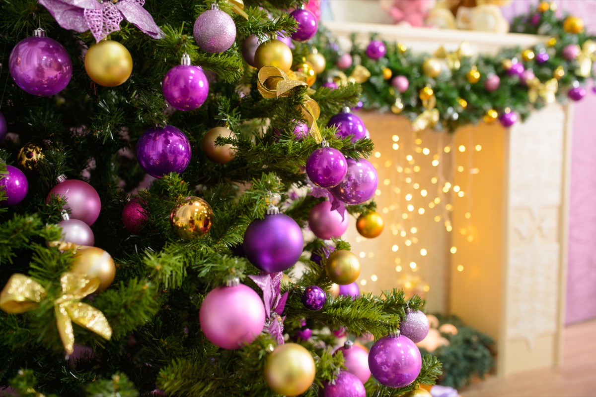 purple and gold ornaments on christmas tree