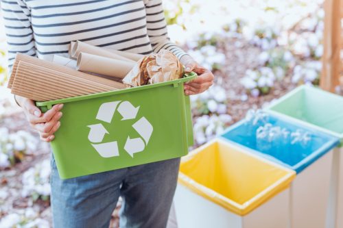 Woman recycling