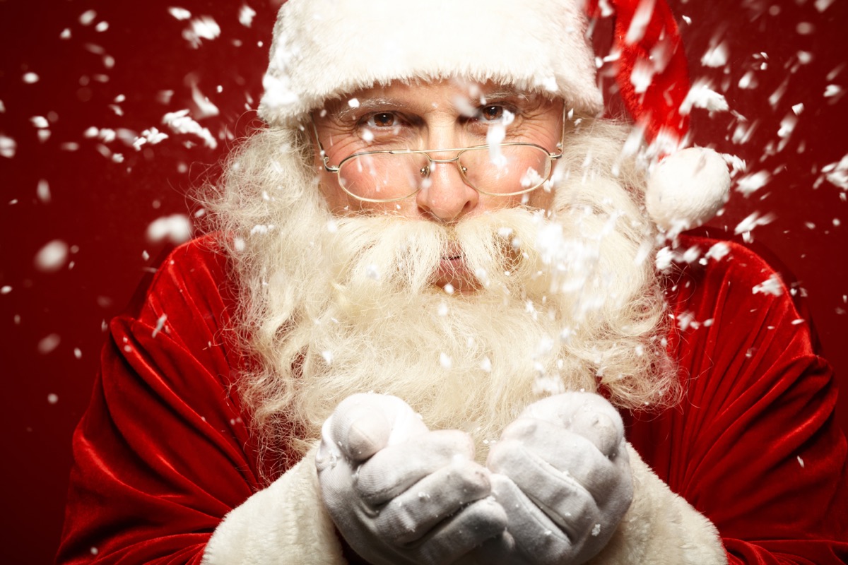 santa claus against a red background