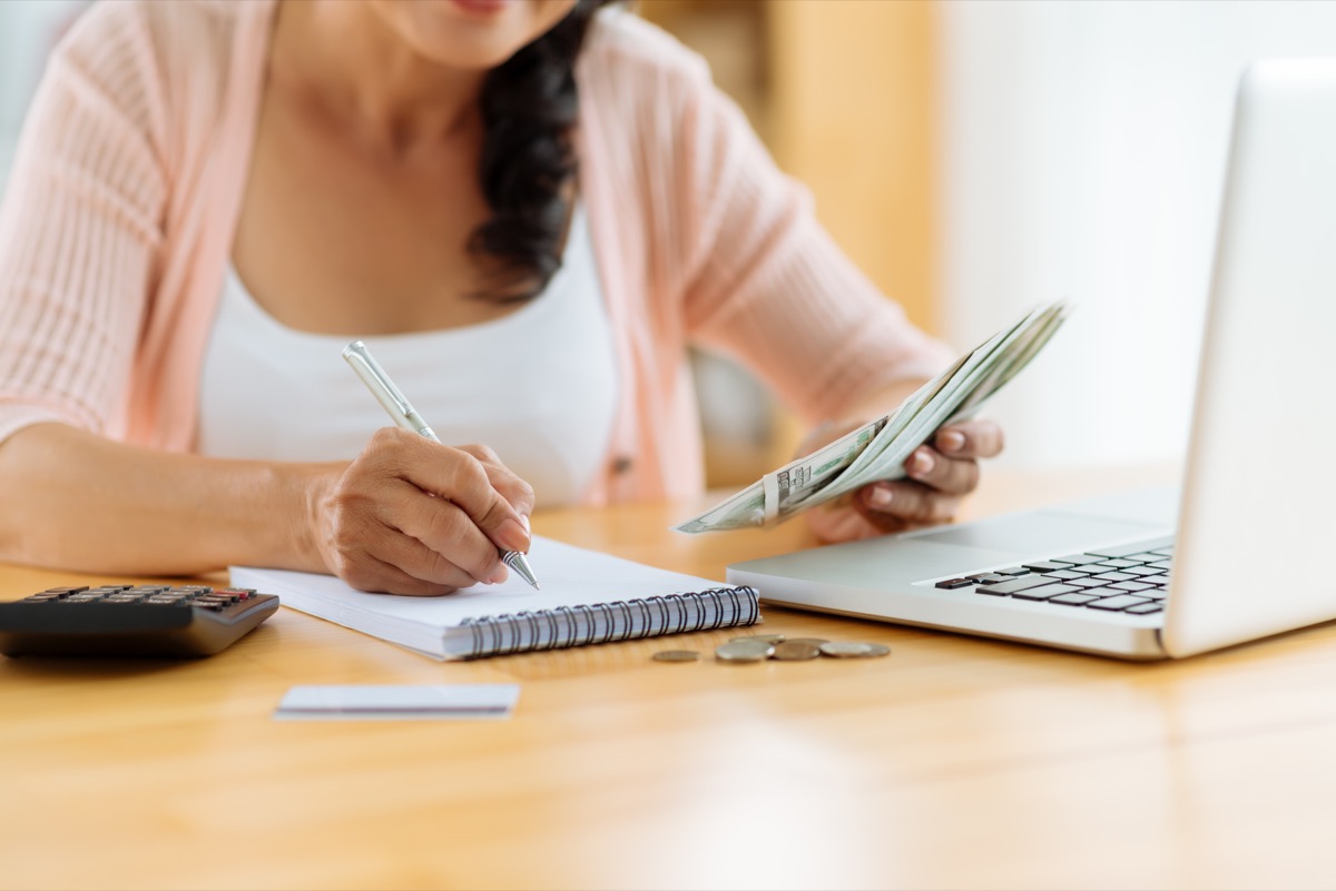 Woman creating a budgeting plan