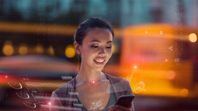 woman using a futuristic smartphone - exciting future predictions