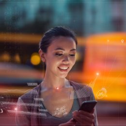 woman using a futuristic smartphone - exciting future predictions