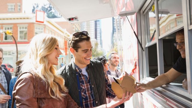 Couple ordering food at a food truck