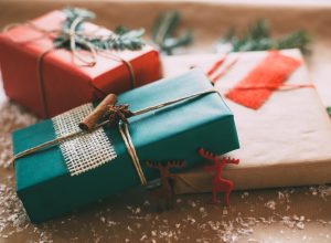 holiday presents wrapped in hipstery wrapping paper