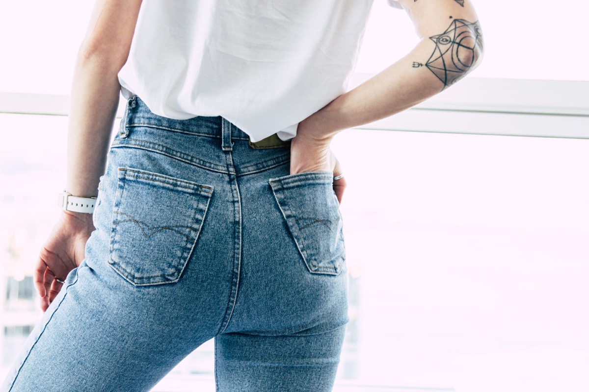 Woman wearing high waisted jeans