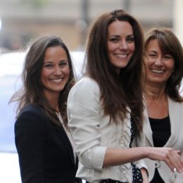 Kate Middleton (M) waves to the crowd outside the Goring Hotel in London, Great Britain, 28 April 2011 together with her Sister Pippa (L) and her mother Carole. London is preparing for the royal wedding of Britain's Prince William and Kate Middleton at Westminster Abbey on April 29.