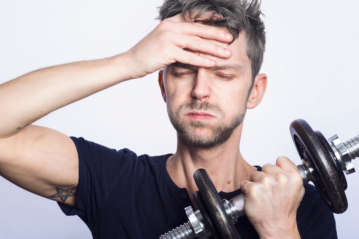 Man at gym frustrated by resolution