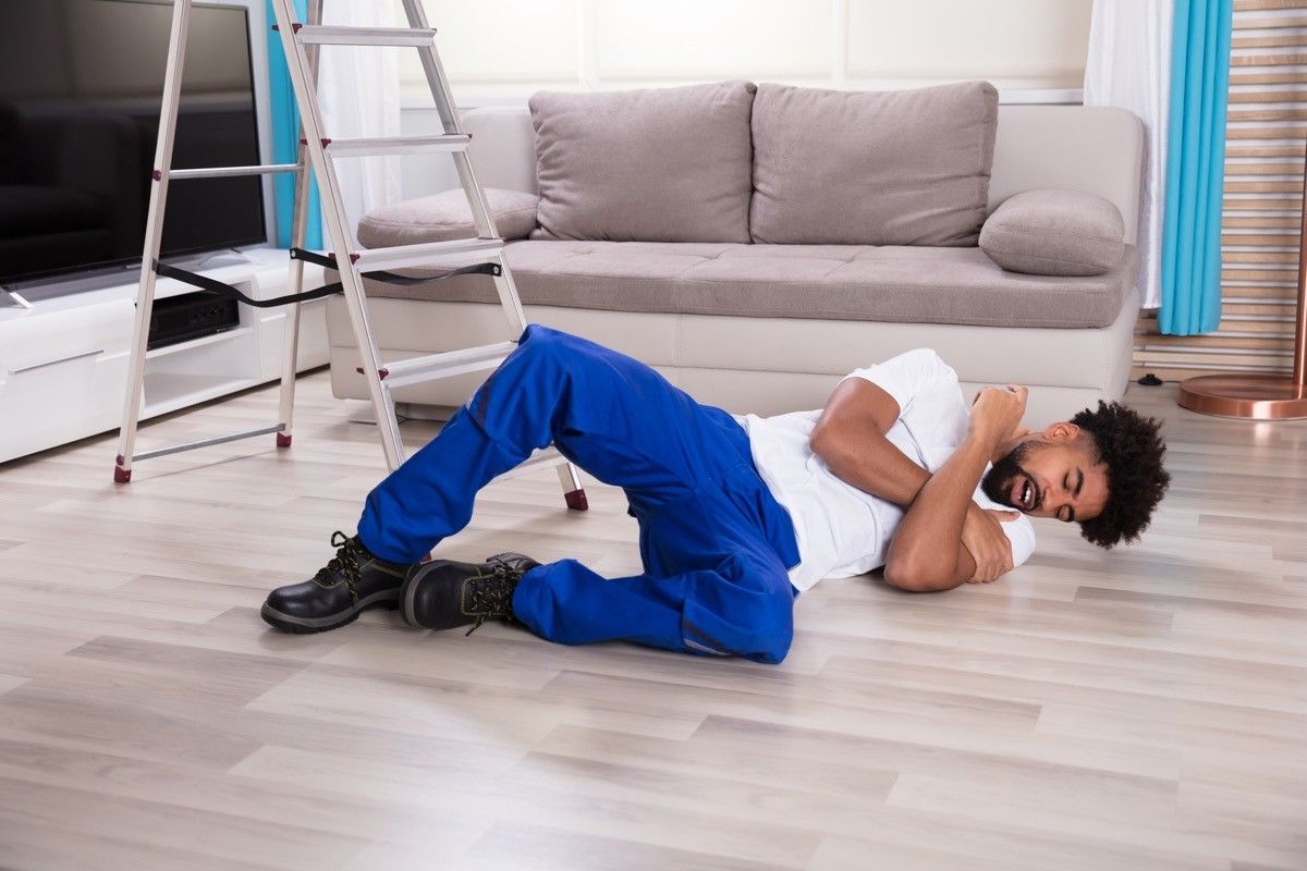 Black man injured after falling off of a ladder