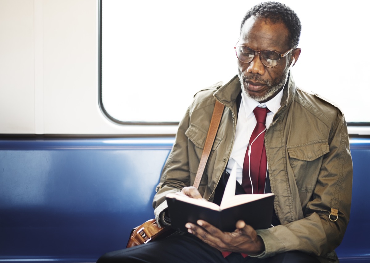 Man Reading on the Subway {Small Resolutions}