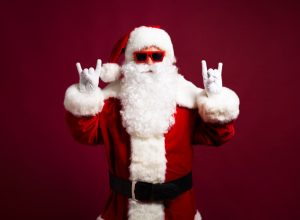 santa claus giving double rock-on sign, things you should never lie to kids about