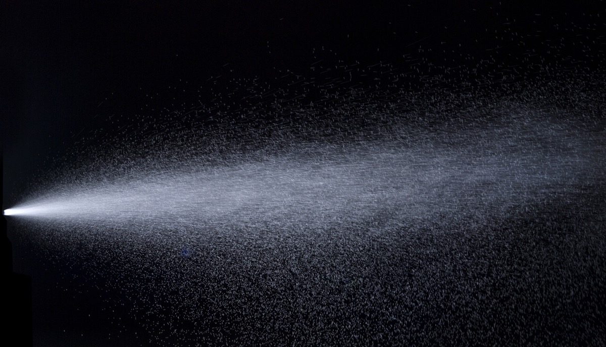 spray in the air on a black background