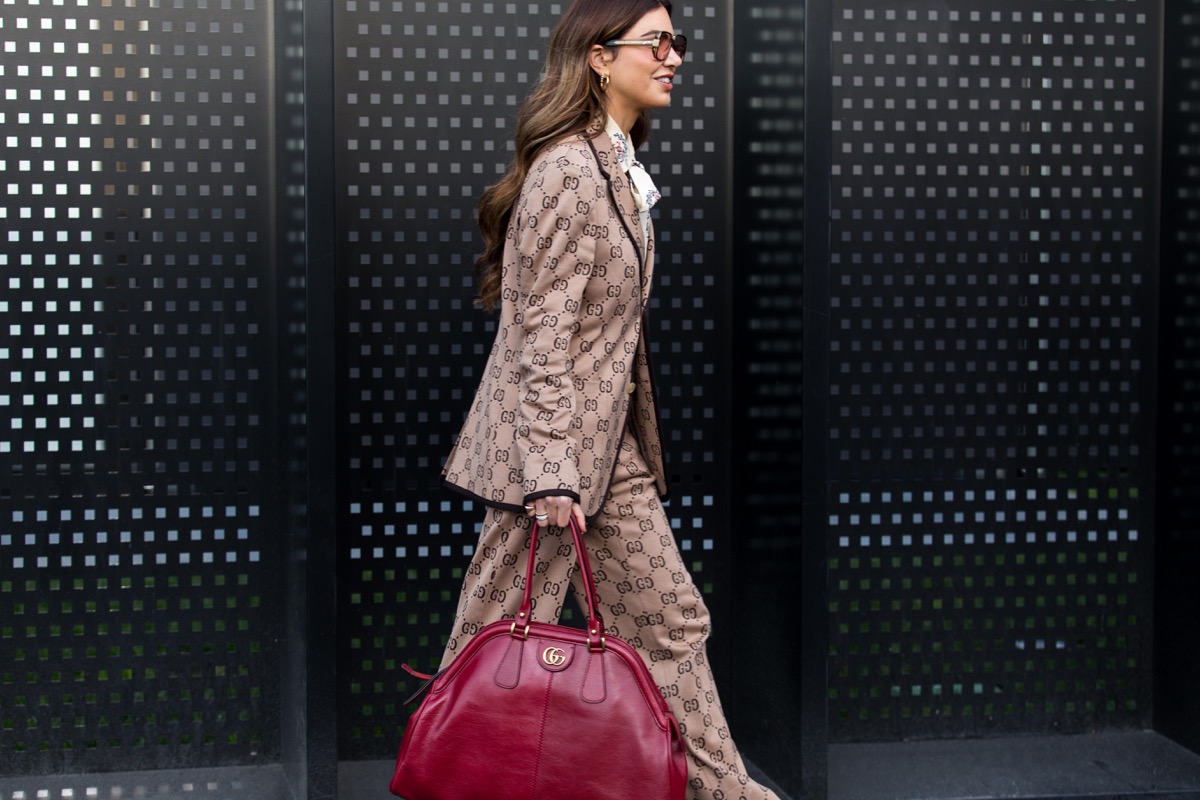 woman wearing all gucci at milan fashion week