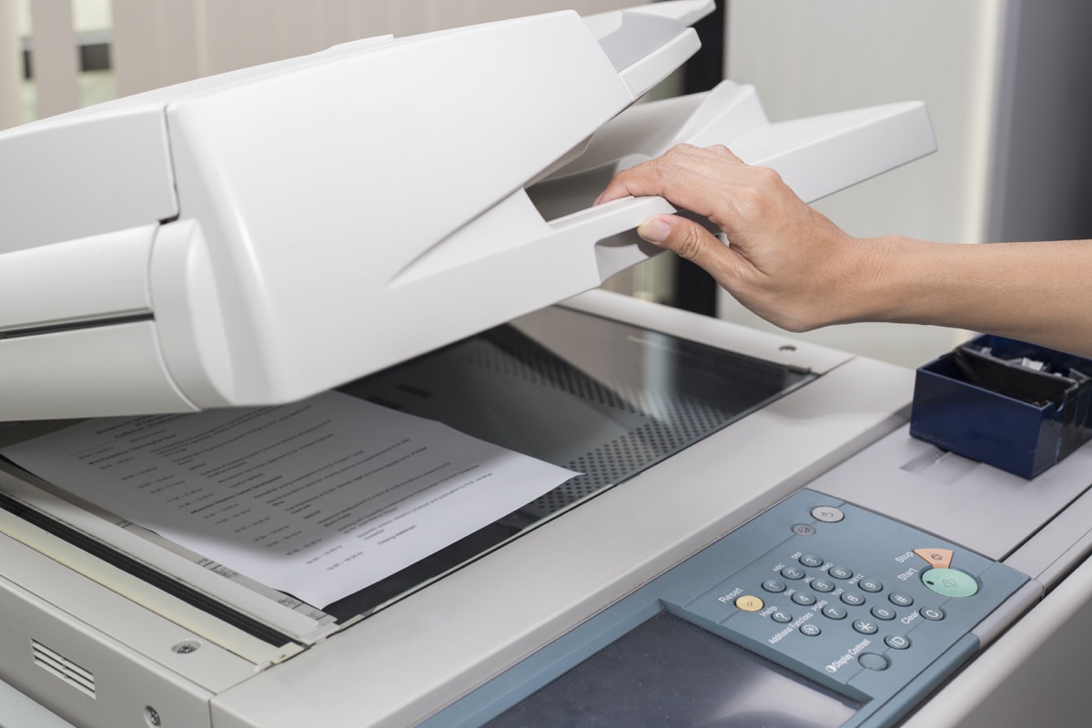 Xerox machine woman making copies