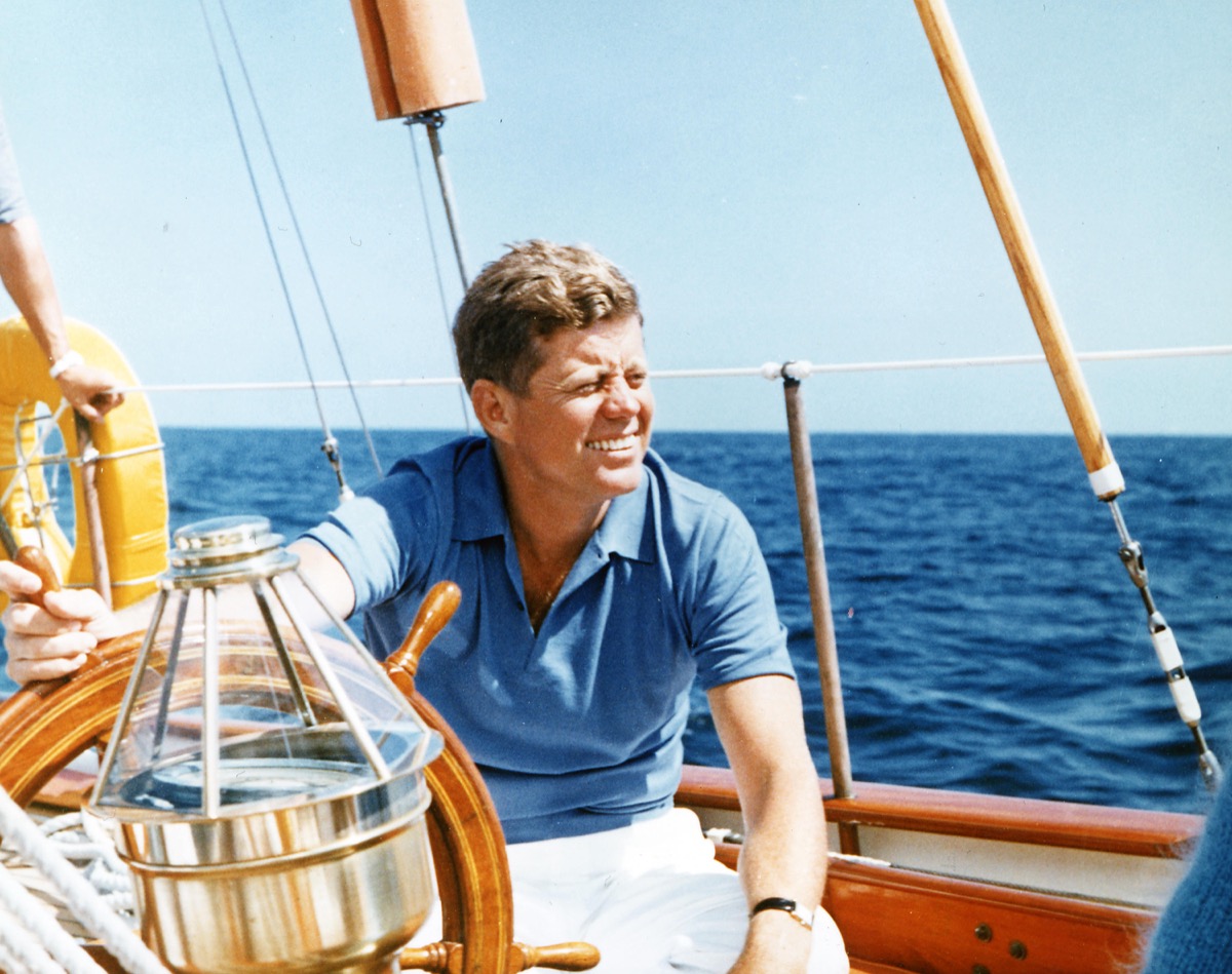 John F. Kennedy on a boat