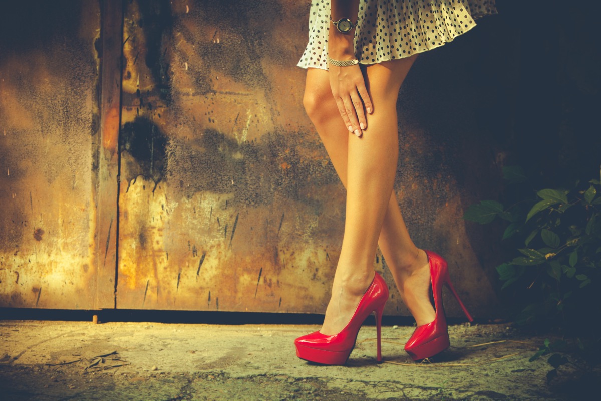 Woman wearing red high heels