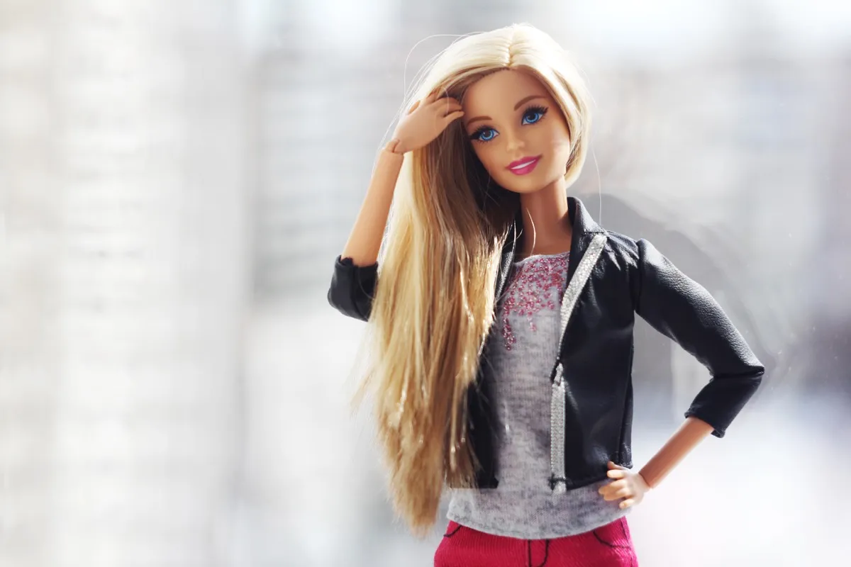A beautiful barbie with white hair. Stylish doll. - Image