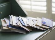 Pile of Mail on a Desk {Secrets Your Mailman Knows}