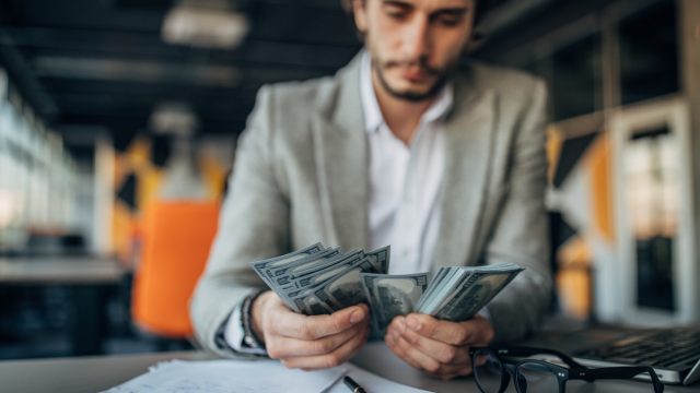 businessman working and counting money