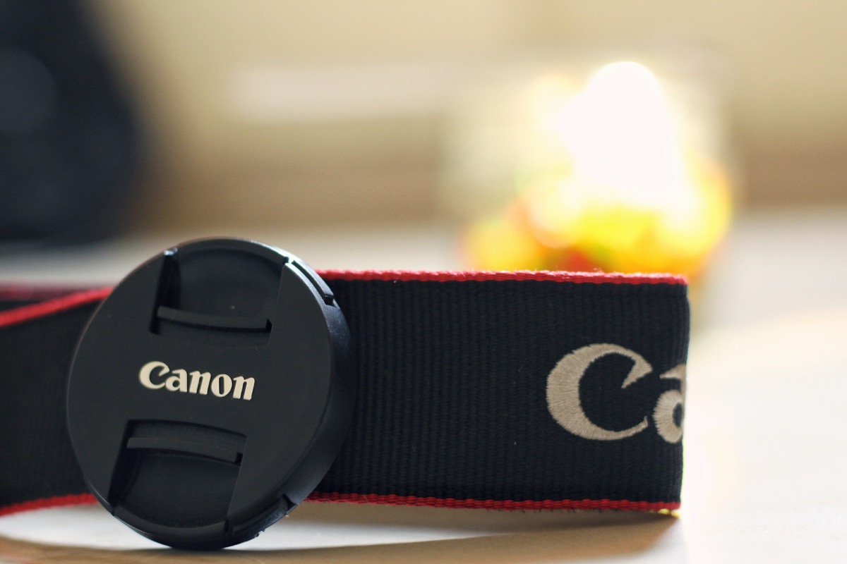 camera strap for canon camera with logo and camera lid, original brand names