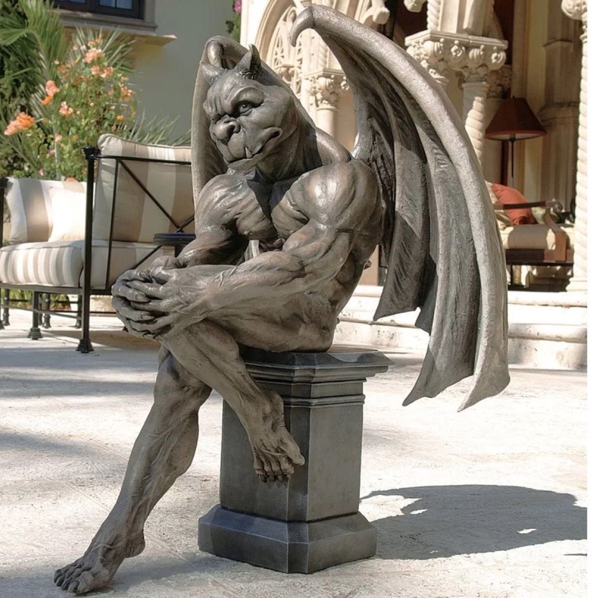 33 Lawn Decorations So Ugly You Ll Laugh Out Loud Best LifeBest Life   Fit Gargoyle 