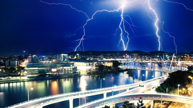 a striking image of lightning strikers over brisbane australia