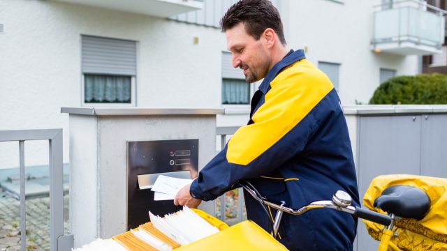 Mailman Delivering Mail {Secrets Your Mailman Knows}