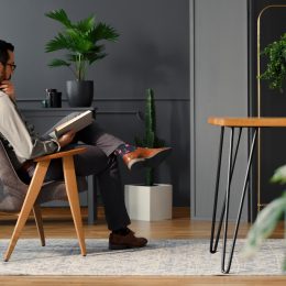 Man with plants in home