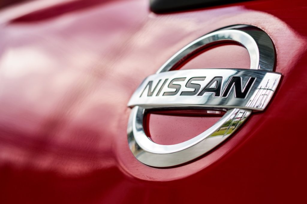 nissan brand company logo on a car, original brand names