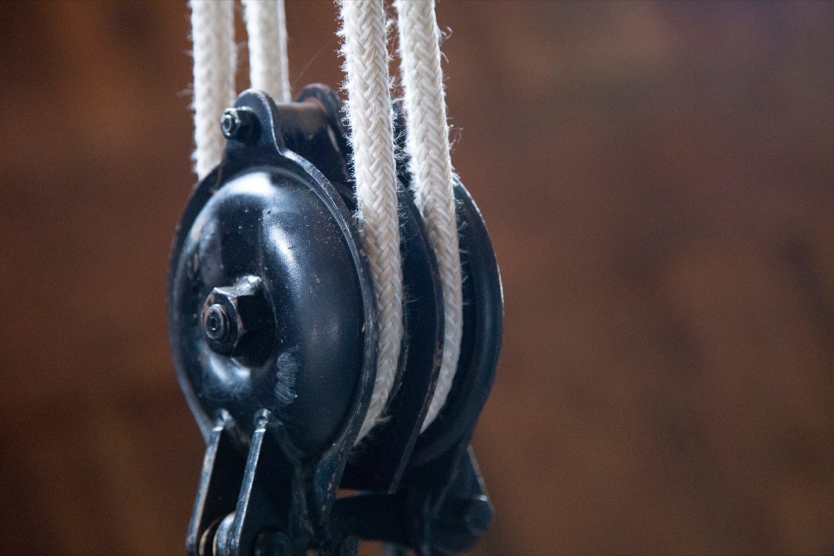 Metal pulley with 2 ropes A pulley is a mechanical device used to transfer mechanical energy