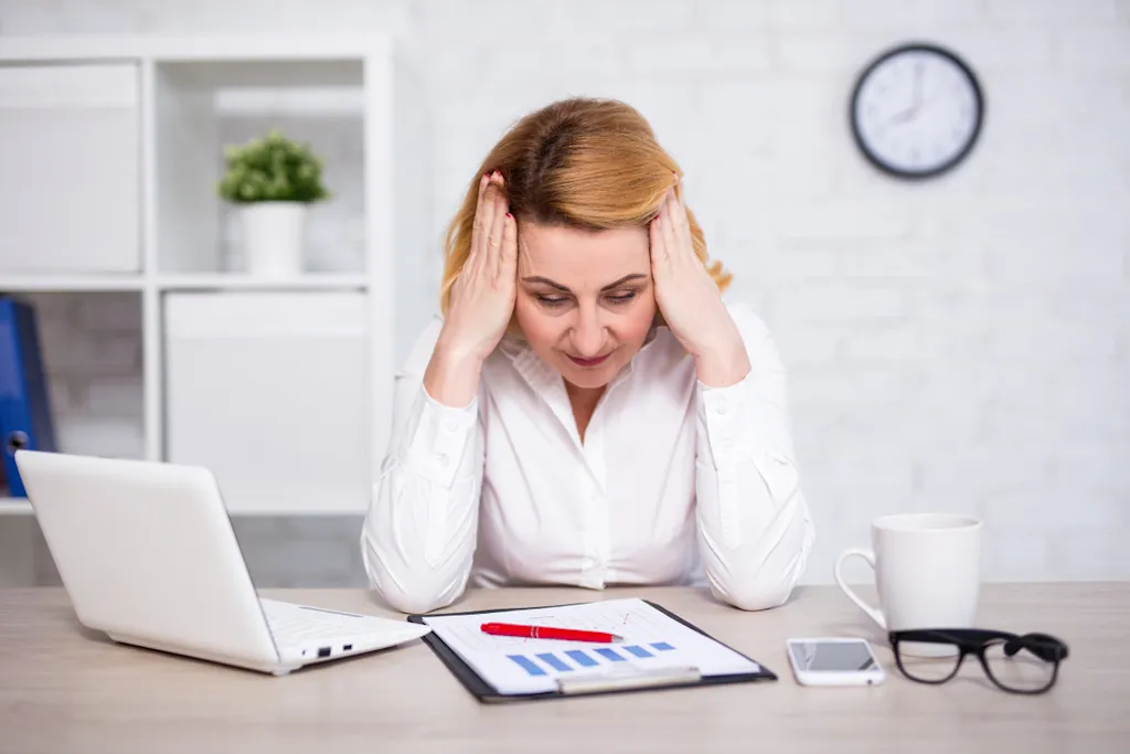 woman stressed by work signs of burnout
