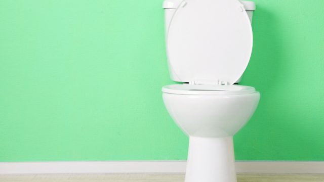 toilet against a sea green wall, diy hacks