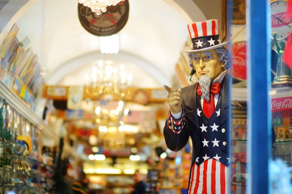statue of Uncle Sam in the doorway of a store