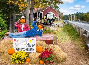 Bartlett, NH, USA - October 12, 2012: Halloween Decoration in Front of the Covered Bridge Gift Shoppe. The historic Bartlett Covered Bridge is one of 53 covered bridges left in New Hampshire. - Image