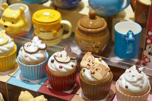 Bangkok, Thailand - Feb 17, 2019 : A photo of Disney Merchandises in stores with selective focus on Mickey Mouse ceramic cupcake. On the right is Chips & Dales the chipmunks. - Image