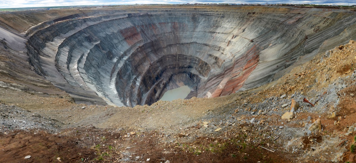 crater covered in snow sinks deep into grown in Yakutia, Russia in Siberia, rare earth events