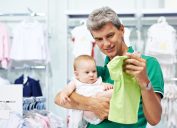 A Baby and Father Shopping for Clothes {Save Money on Kids' Clothes}
