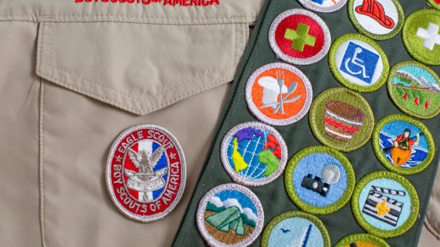 SAINT LOUIS, UNITED STATES - OCTOBER 16, 2017: Eagle patch and merit badge sash on Boy Scouts of America (BSA) uniform - Image